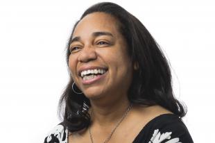 Denise Isom, the interim vice president for the office of university diversity and inclusion, smiles for a portrait.
