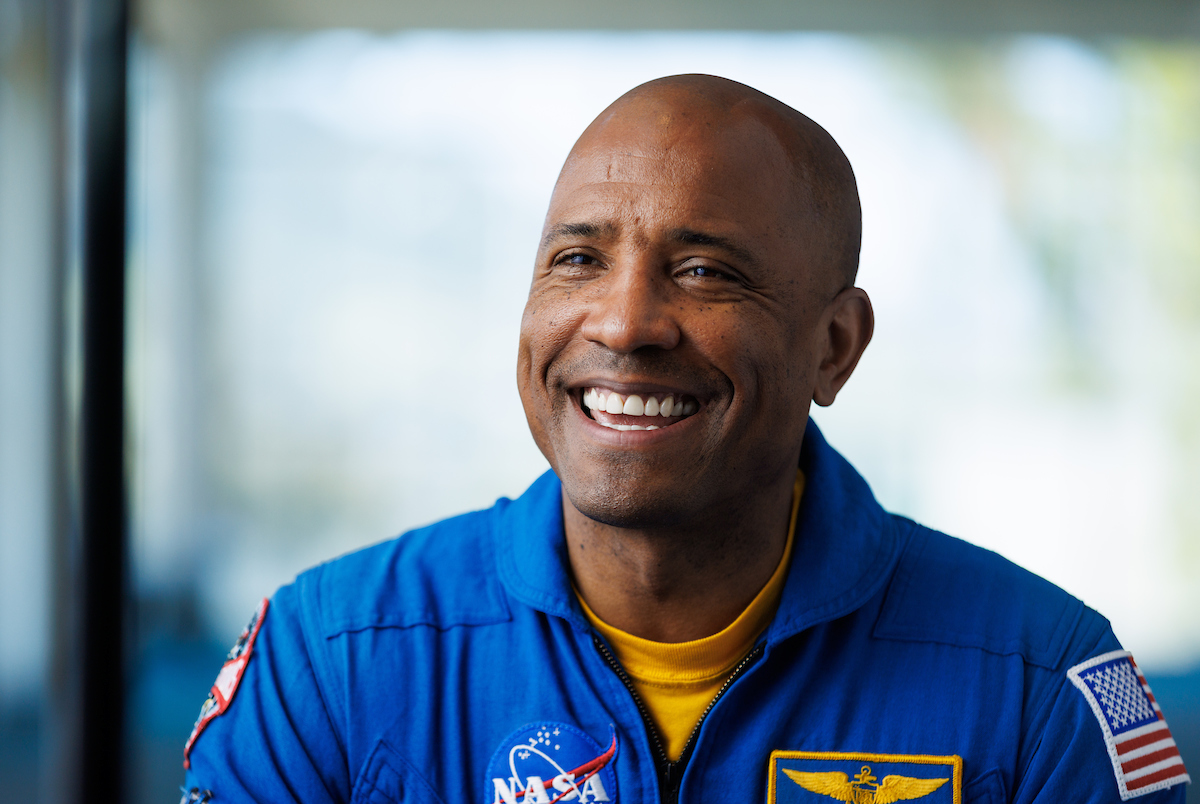 A headshot of astronaut Victor Glover in his official blue jumpsuit.