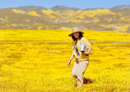 A student photographed during the spring super bloom is Cal Poly contest entry