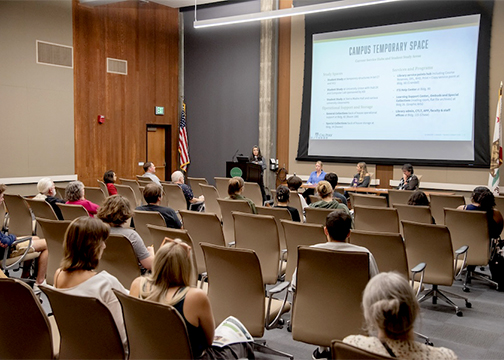 Attendees gather at a past Kennedy Library town hall update workshop