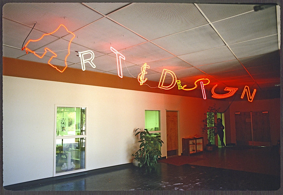 Art and design neon sign in space.