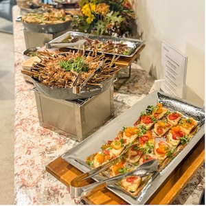 Buffet of food displayed on a countertop.