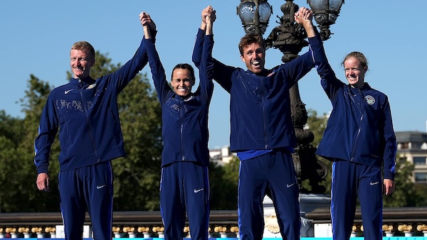 Taylor Spivey and her teammates on the podium after winning silver.