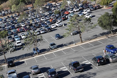 Parking lot with cars.