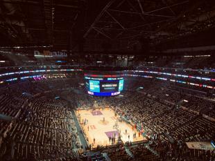 A stock image of a basketball stadium during an NBA game.