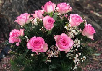 A bouquet of pink roses made by the Poly Plant Shop.