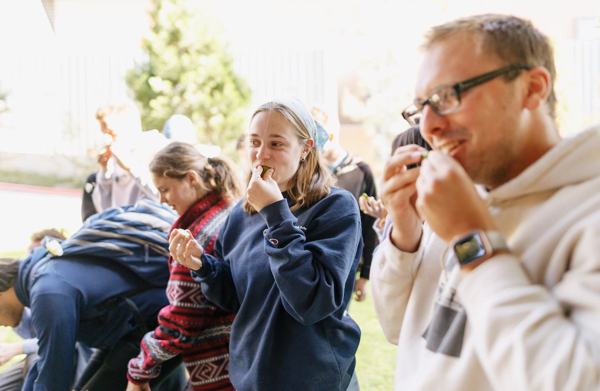 Students try wedges of citrus and lime during an on-campus taste test party for class.