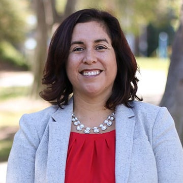 An outdoor photograph of Professor Julie Garcia