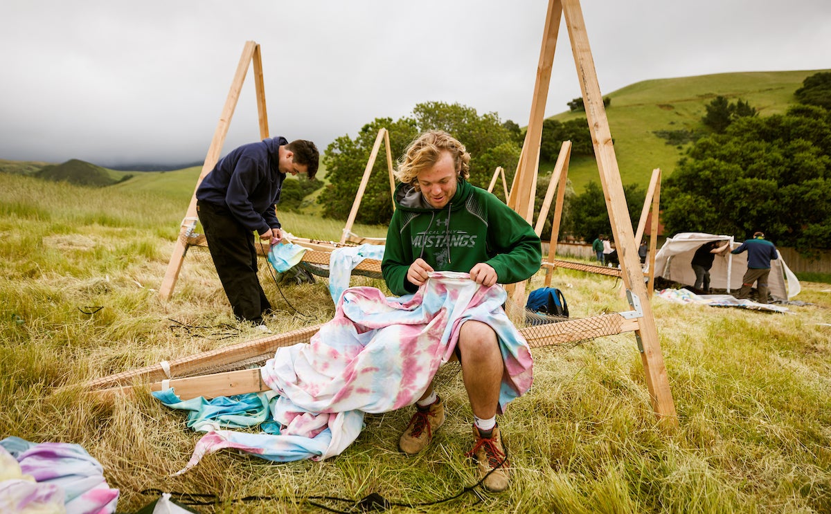 Two students work on their structure in Poly Canyon.