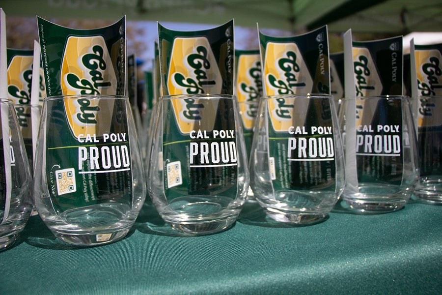 a grouping of stemless wine glasses with Cal Poly Proud logos