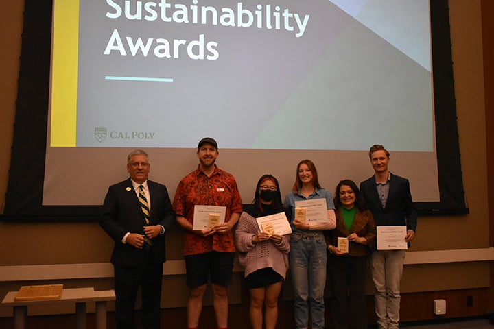 From left, President Armstrong, Erin Pearse, Emily Zhou, Kalea Conrad, Marlene Cramer and Niles Werts