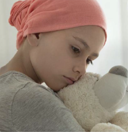 A child holds a stuffed teddy bear.