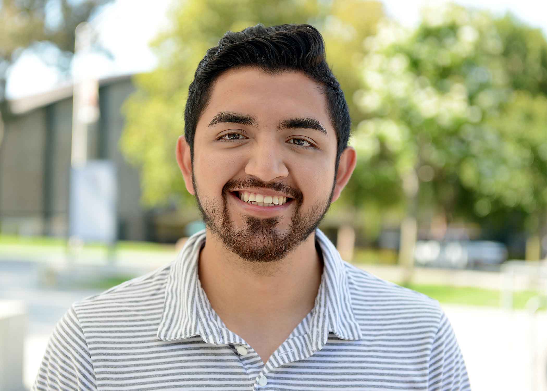 2019 Cal Poly graduate Jorge Valdez smiles for a photo. 