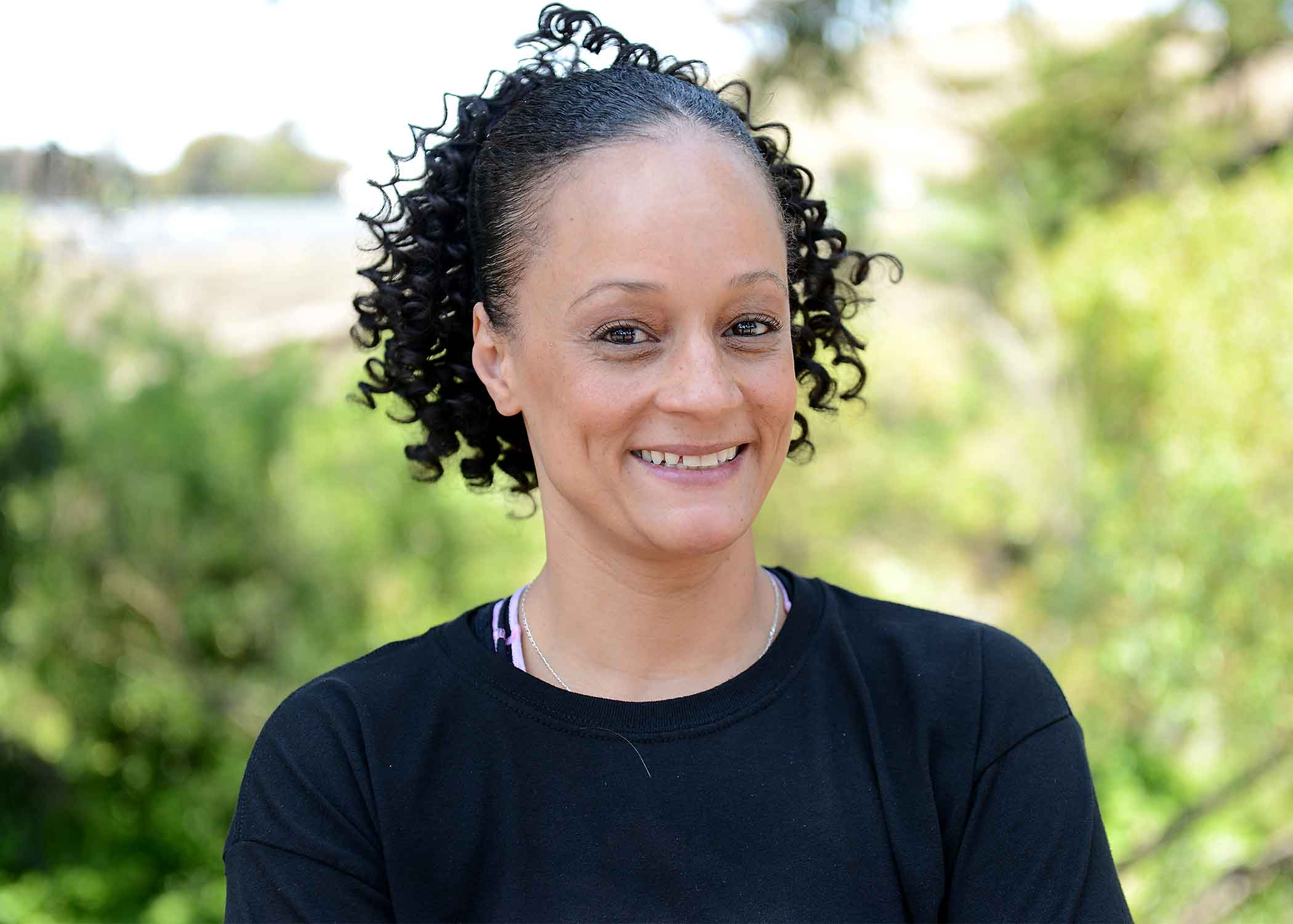 Mia Alexander, a 2019 Cal Poly graduate, smiles for a photo on campus. 