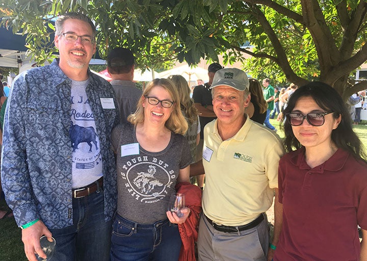 Attendees enjoy an event at a past Open House