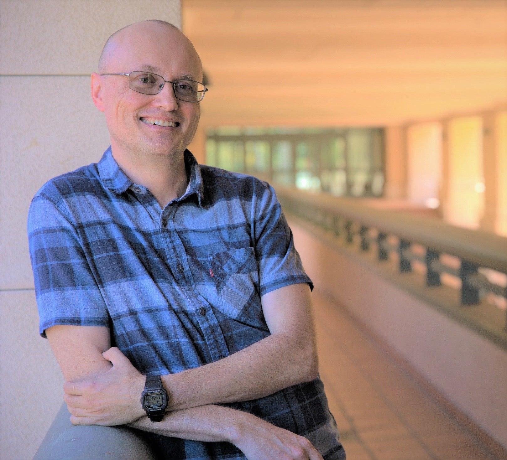 Finance professor Ziemowit Bednarek poses for a professional headshot.