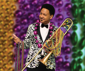 Image of Delfeayo Marsalis in Mardi Gras attire.