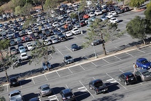 Parking lot with cars.