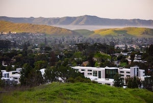 View of Cal Poly campus with green rolling hills.