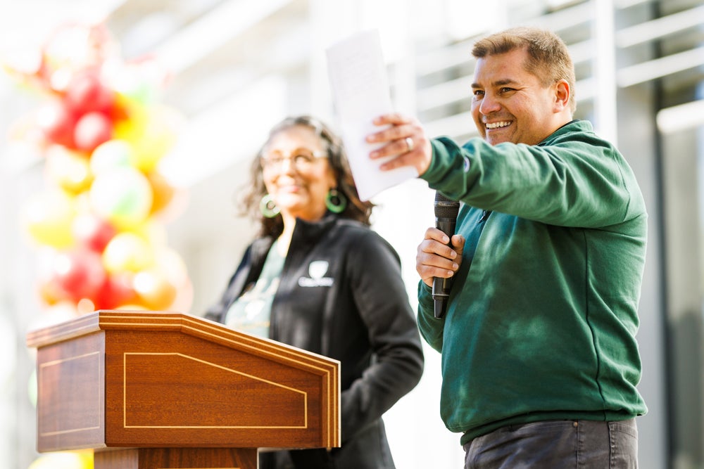 Two alumni speak at La CASA's grand opening