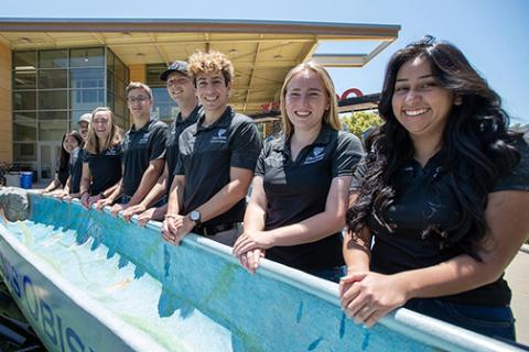 Members of the 2023 national concrete canoe winners and their canoe