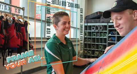 An ASI student worker rents a surfboard to a student surfer