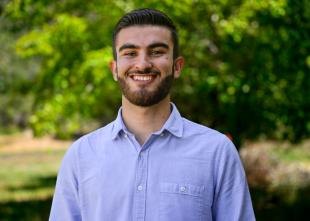 Misael Gonzalez Ramirez smiles for a photo.