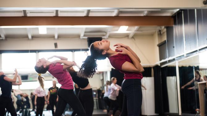 students rehearse their dance