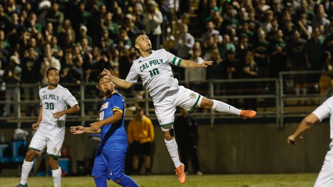 Man heading ball at Cal Poly vs. UCSB soccer game