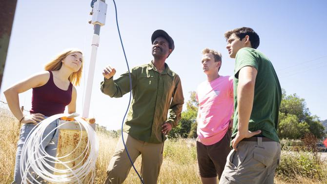 With Dr. Bwalya Malama and students monitoring a well on campus. 