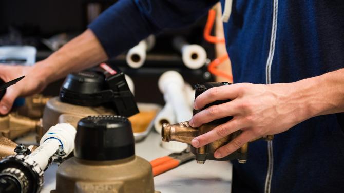 Student working with equipment. 