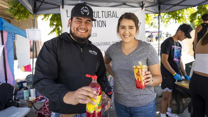 Latinx Cultural Association members sell fruit at Culturefest.